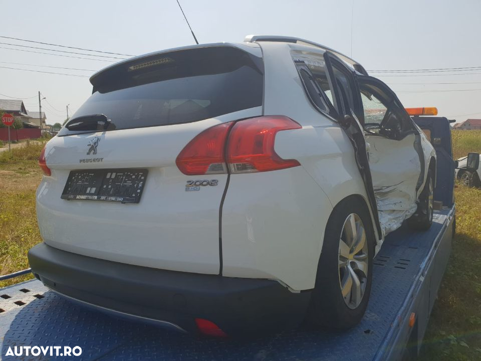 dezmembrez Peugeot 2008 VOLAN STANGA an 2014 motor 1.6hdi 68kw 92cp 9HP cutie de viteze automata usa portiera stanga fata spate navigatie cu touchscreen dezmembrari 207, 208 2008 508 5008 3008 - 7