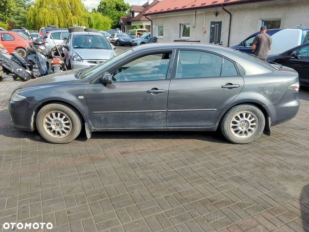 Mazda 6 GG1/GY1 FL (05-07r.) 2.0 D 141KM. Silnik Skrzynia.Cały na części. GWARANCJA !!! Przód Tył Zestaw Komplet Drzwi Klapa Zderzak Błotnik Maska Grill Atrapa Szyba Pas Lampa Lusterko Boczki Fotel Kanapa Kokpit Deska Rozdzielcza Przełącznik Włącznik Sterownik Przewody Wiązka Instalacja Moduł Komputer Czujnik Listwa Pompa Alternator Wtryski Głowica Rozrusznik Kompresor Sprzęgło Dwumas Silnik Skrzynia ABS Klimatyzacji Paliwa Wspomagania Kolektor Turbina Przepustnica Zawór Chłodnica Koło Hak Belka Sanki Zawieszenie Mcpherson Półoś Amortyzator Wydech Tłumik Zacisk Most - 3