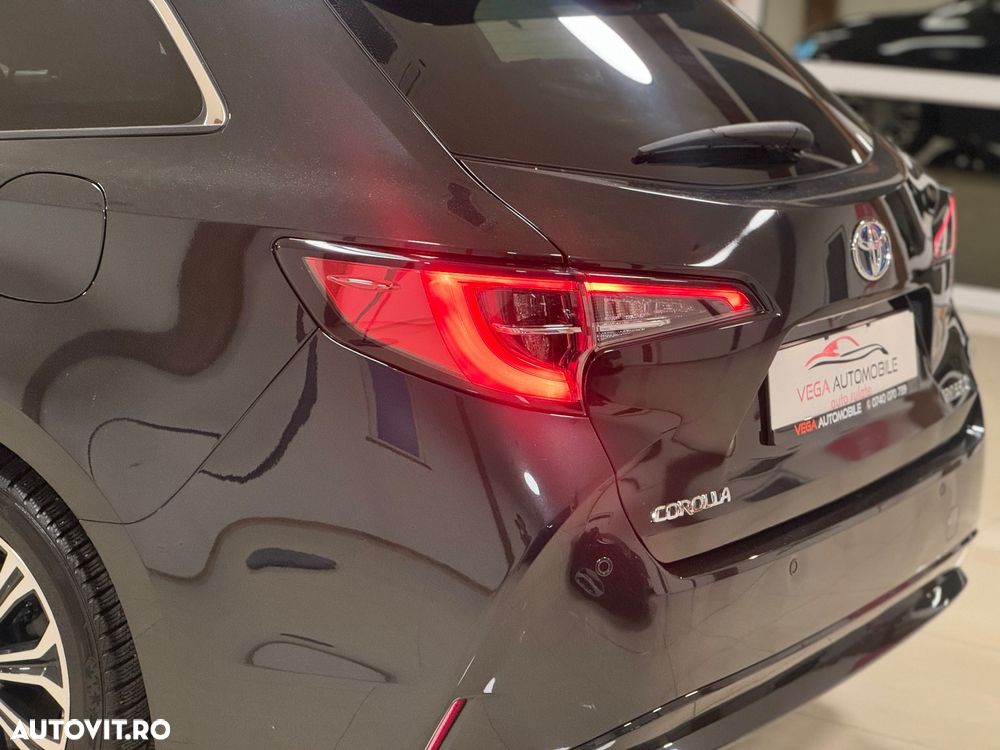 Toyota Corolla 1.8 HSD Exclusive - 30