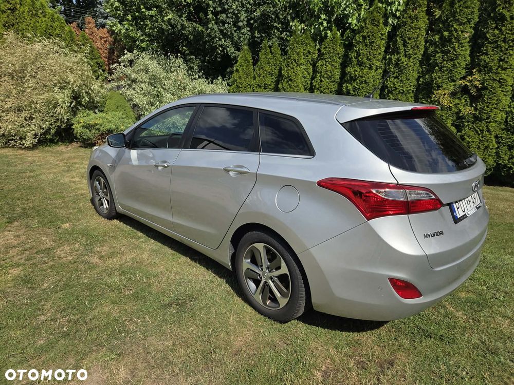 Hyundai i30 blue Kombi 1.4 Trend - 14