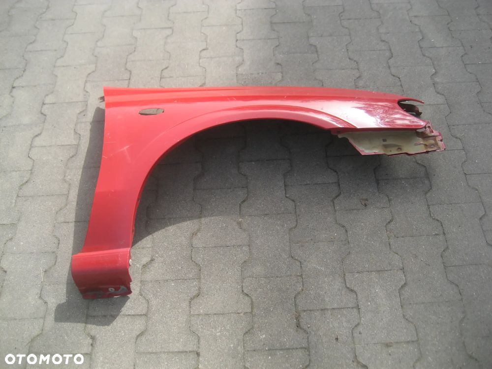 nissan almera n16 lift 00-05r błotnik przód prawy