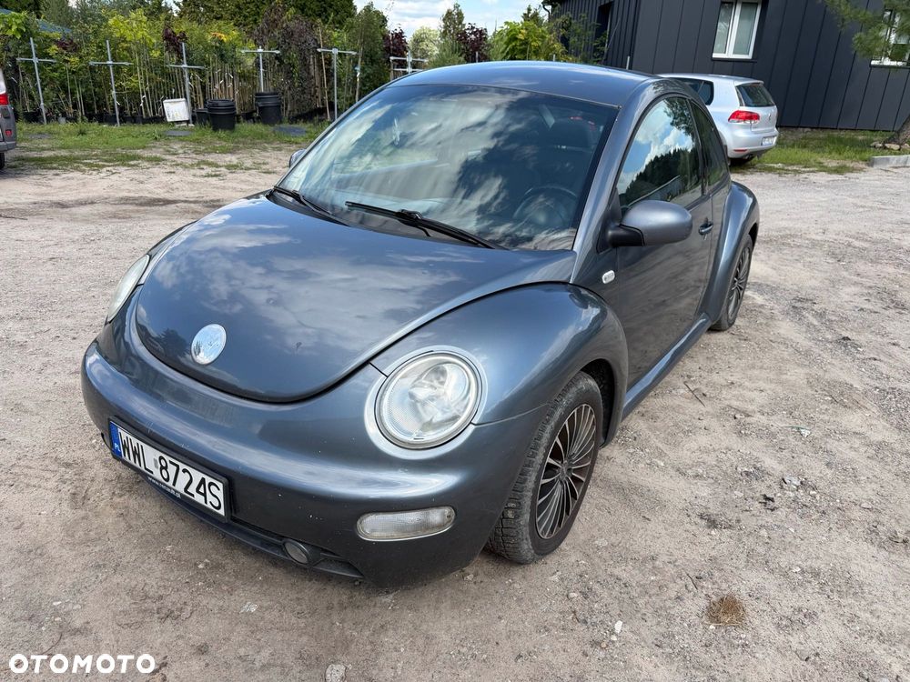 Volkswagen New Beetle - 1