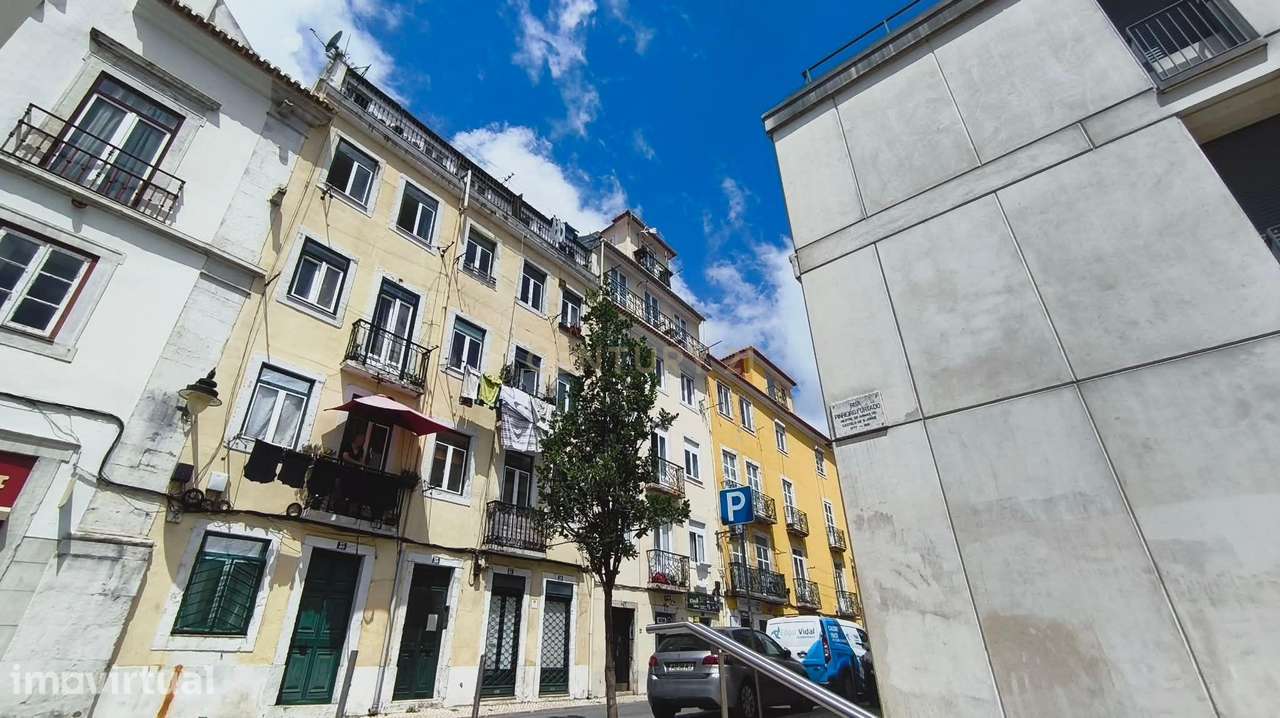 Apartamento com História e Vista Infinita na Baixa Pombalina em Lisboa - Grande imagem: 3/12