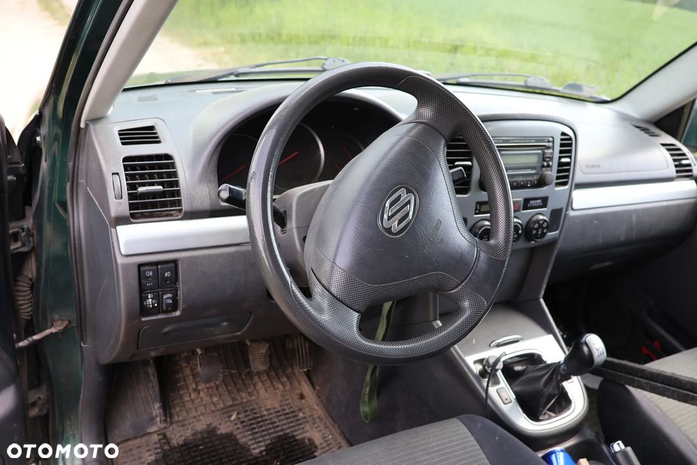 Suzuki Grand Vitara 1.6 - 13