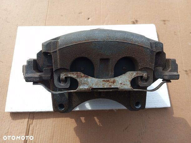 Zacisk prawy przedni Ford Edge II 3.5V6 2014- - 3