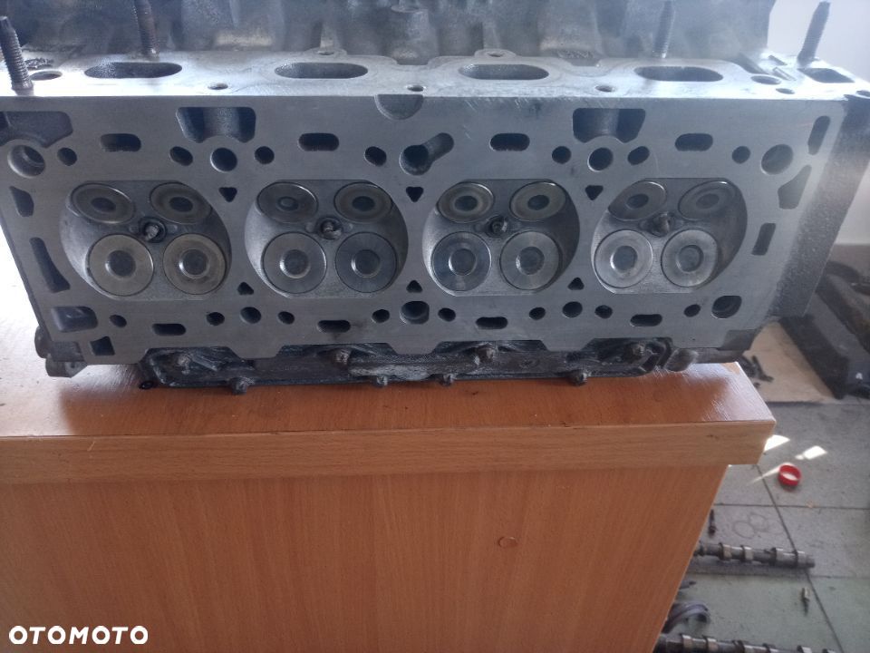 głowica astra zafira b 1.6 16v z16xe1 55559597 - 1