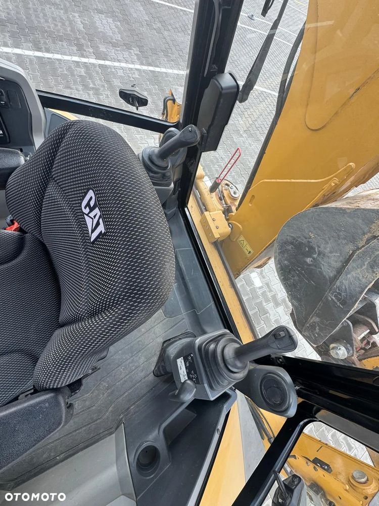 Caterpillar 428 - 38