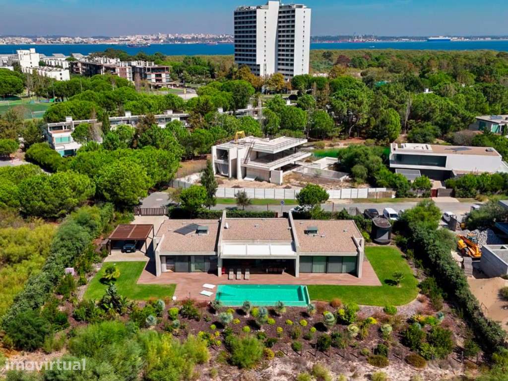 Moradia com Piscina na Primeira Linha de Praia em Tróia - Grande imagem: 3/32