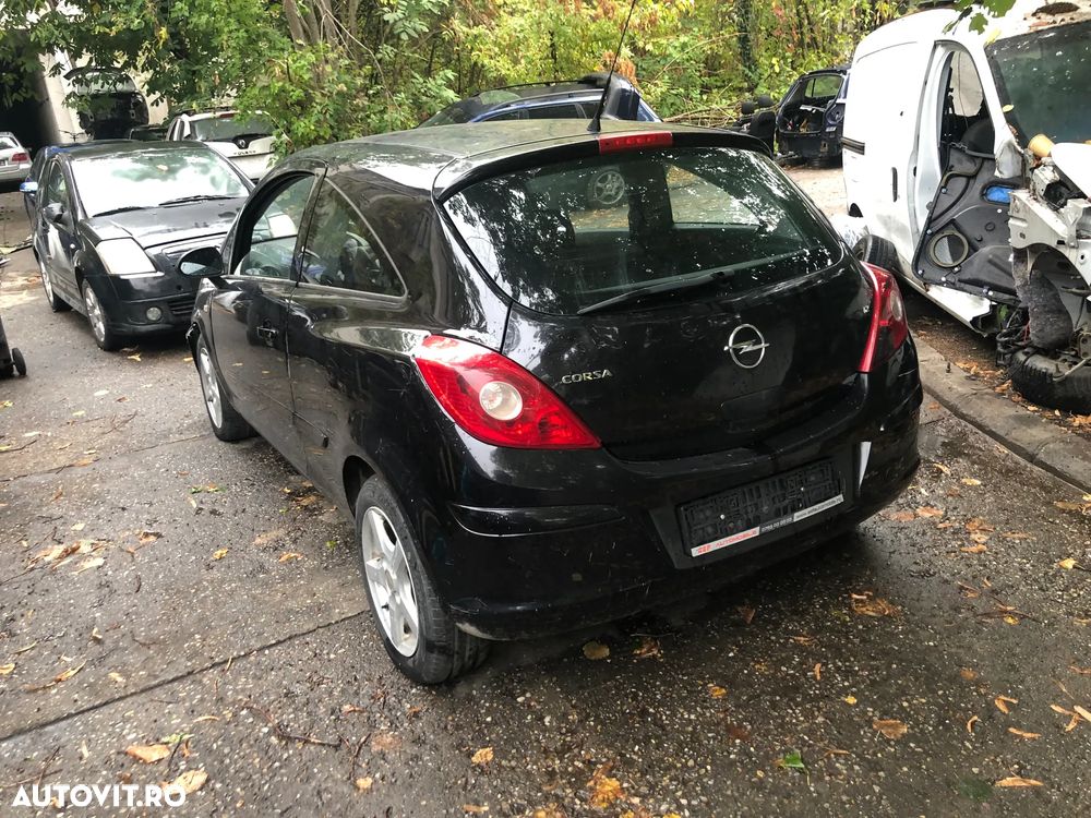 Dezmembrez Opel Corsa D coupe negru benzina 1,2 2007 - 9