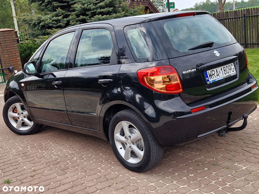 Suzuki SX4 1.6 GLX / Comfort - 9