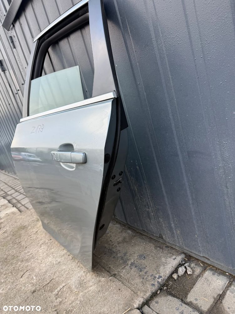 Opel Astra J IV KOMBI drzwi tylne tył lewe Z179 - 3
