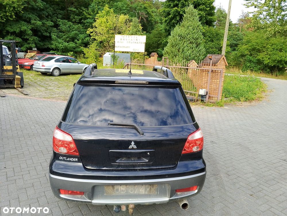 Mitsubishi Outlander CU0W (I) (01-06.) 2.0 B 136KM. Silnik 4G63 Skrzynia F5M42 lakier X42A.Cały na części. GWARANCJA !!!  Przód Tył Zestaw Komplet Drzwi Klapa Zderzak Błotnik Maska Grill Atrapa Szyba Pas Lampa Lusterko Boczki Fotel Kanapa Kokpit Deska Rozdzielcza Przełącznik Włącznik Sterownik Przewody Wiązka Instalacja Moduł Komputer Czujnik Listwa Pompa Alternator Wtryski Głowica Rozrusznik Kompresor Sprzęgło Dwumas Silnik Skrzynia ABS Klimatyzacji Paliwa Wspomagania Kolektor Turbina Przepustnica Zawór Chłodnica Koło Hak Belka Sanki Zawieszenie Mcpherson Półoś Amortyzator Wydech Tłumik Zacisk Most - 4