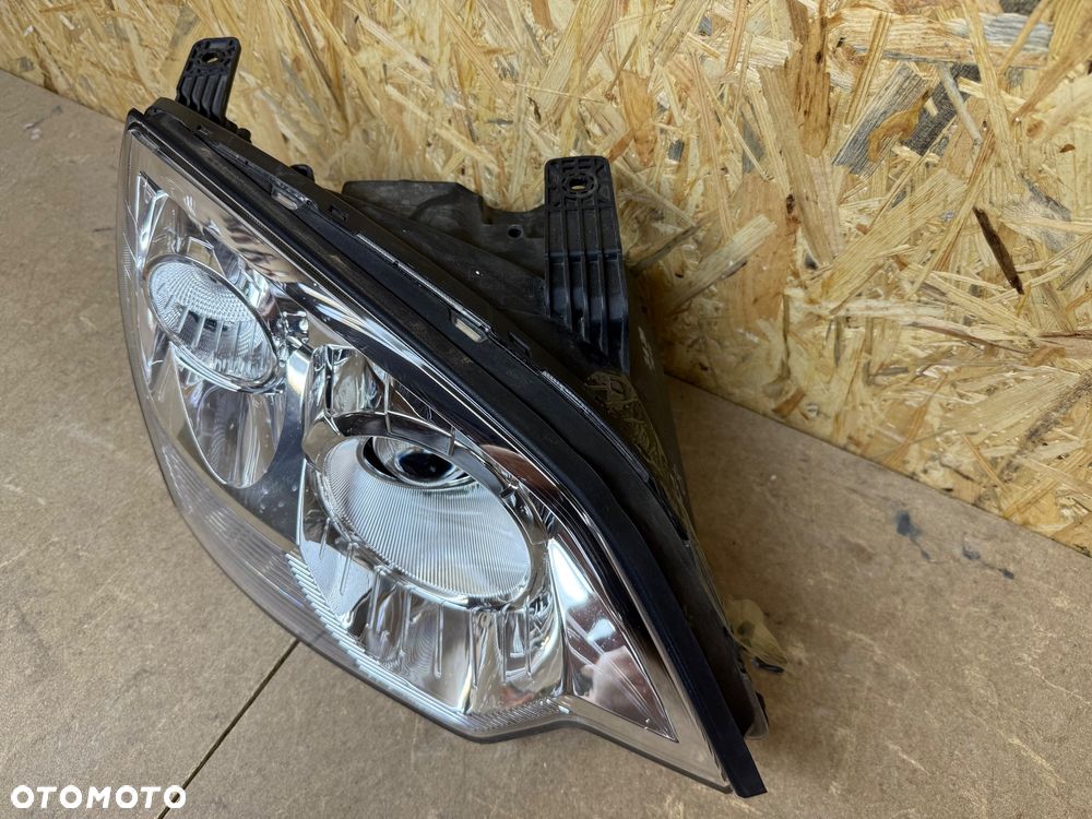LAMPA PRAWA XENON OPEL ANTARA LIFT - 11