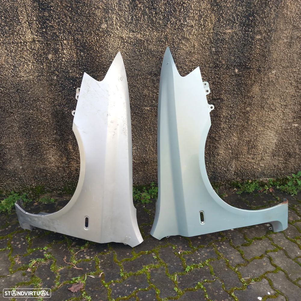 Guarda lamas lado condutor fiat stilo ano 2002 - 1