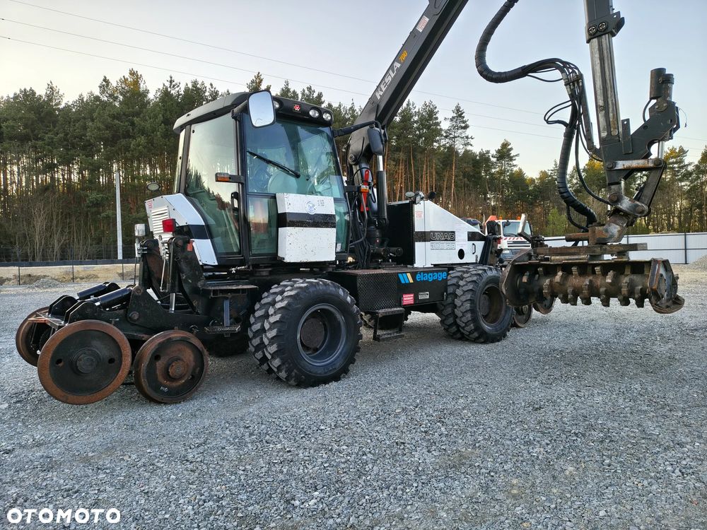 Caterpillar UNAC 300RR Mulczer kolejowy Liebherr atlas dwudrogowy zw - 13