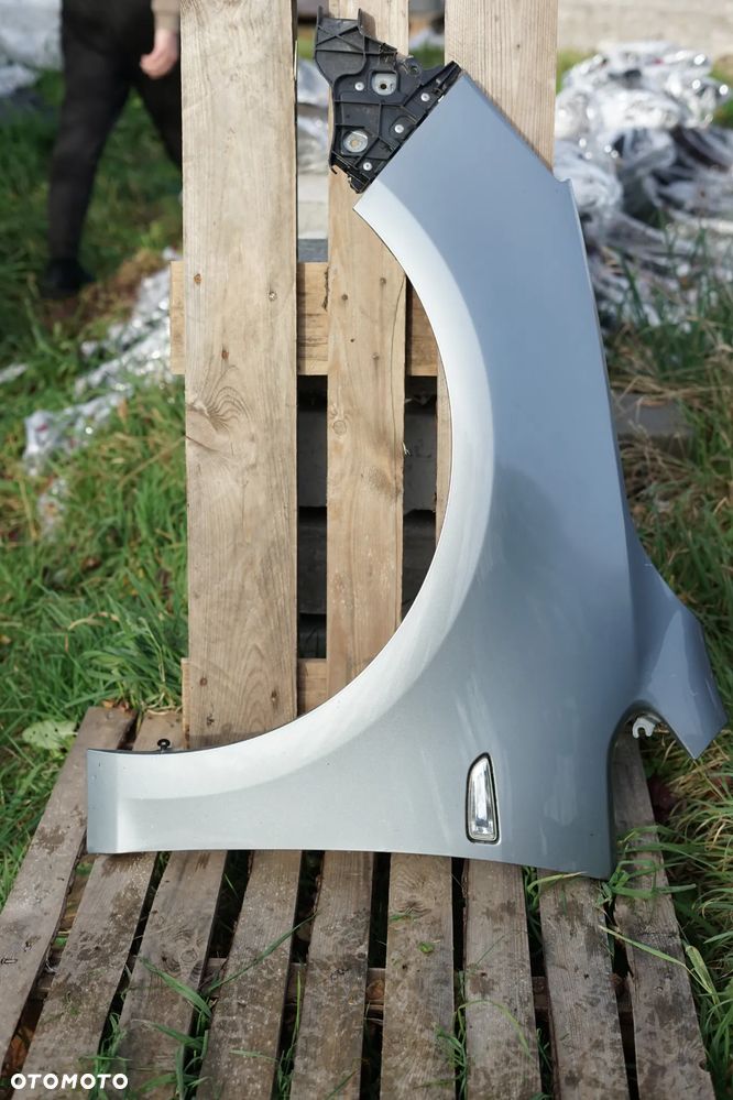 Błotnik przód przedni lewy Opel Astra IV J Z179 - 1