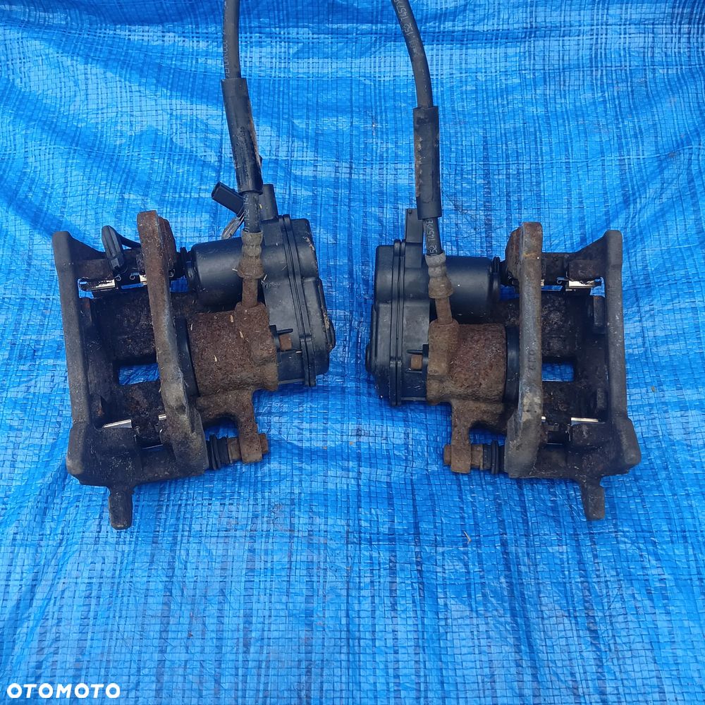 ZACISK HAMULCOWY Z SILNICZKIEM PRAWY LEWY TYŁ TYLNY AUDI A6 C7 A7 C7 ; 644GNO64 3.0L diesel - 2