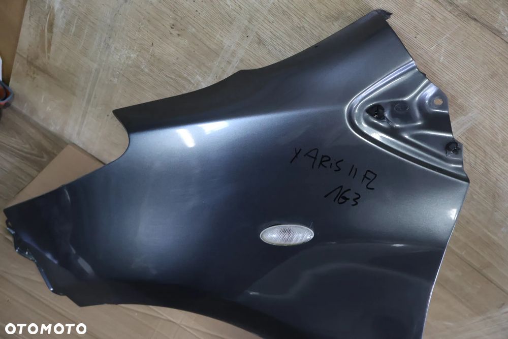 TOYOTA YARIS II 2 LIFT 09-11 BŁOTNIK LEWY PRZÓD PRZEDNI 1G3 - 2