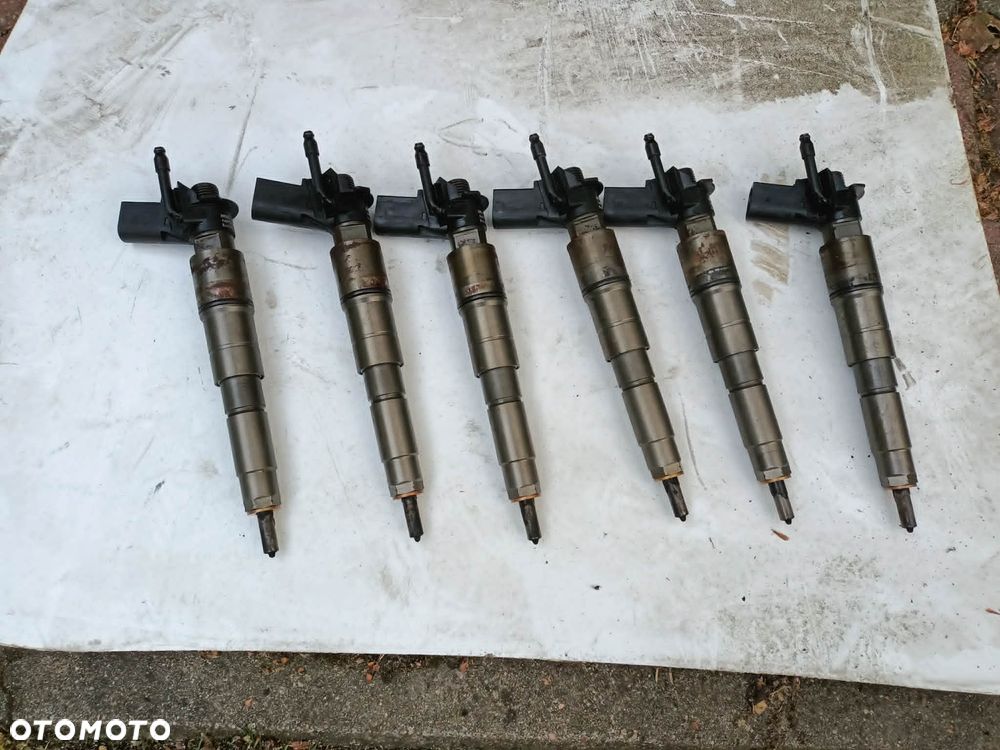 Wtrysk wtryskiwacz wtryski komplet BMW E90 E60 E83 X3 X5 E70 3.0d M57n 7796042