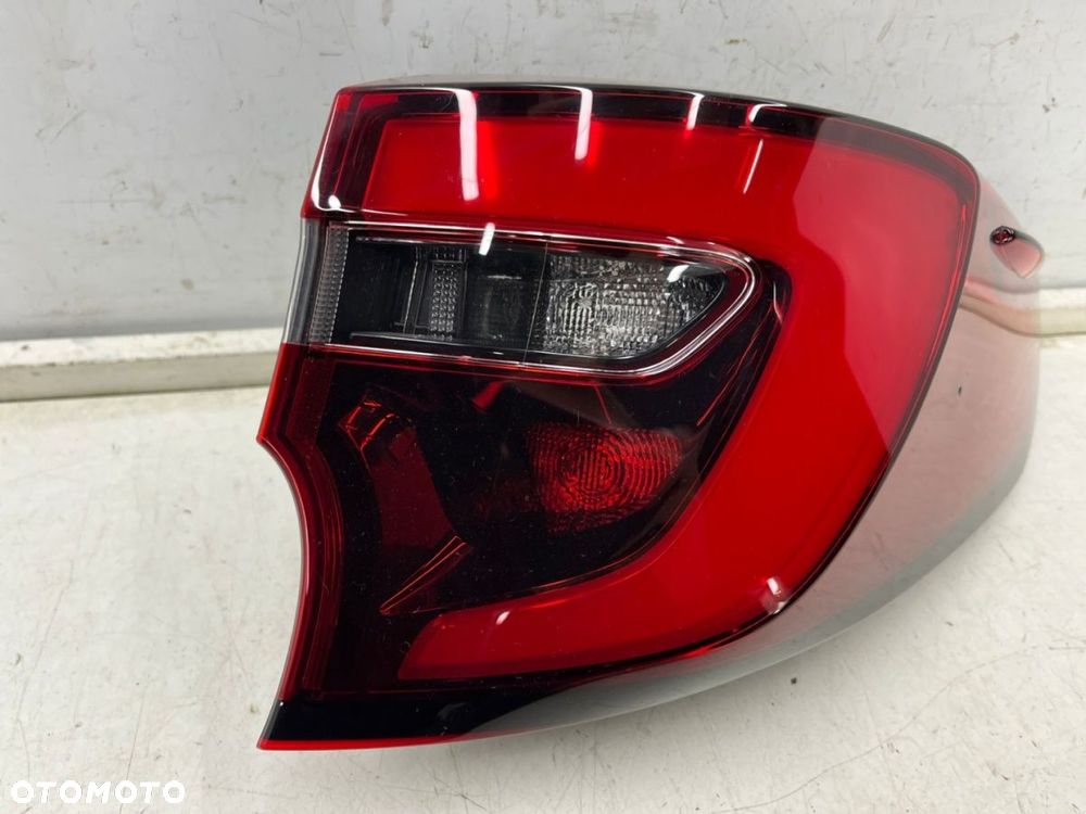 Lampa Toyota Corolla XII E21 kombi LIFT 22r.- PRAWA tylna w błotnik oryginalna Europa - 3