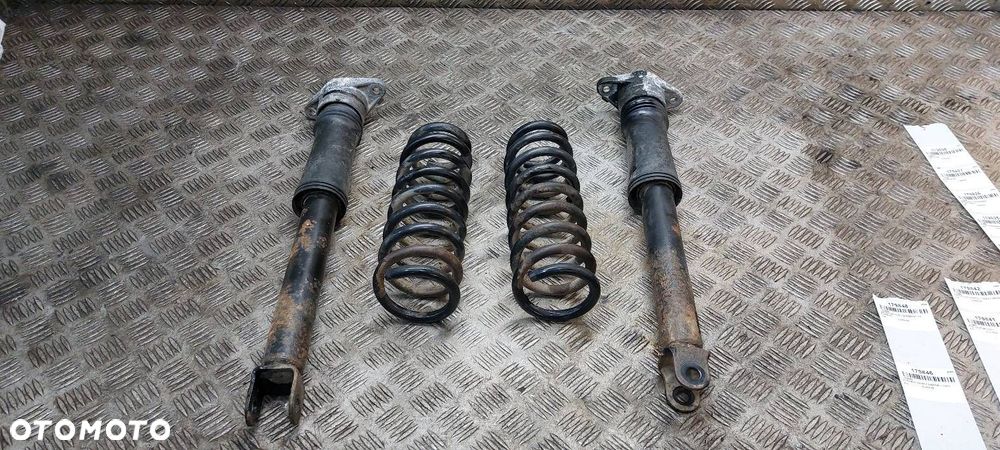 AMORTYZATORY + SPRĘŻYNY TYŁ KOMPLET KIA CARENS III - 1