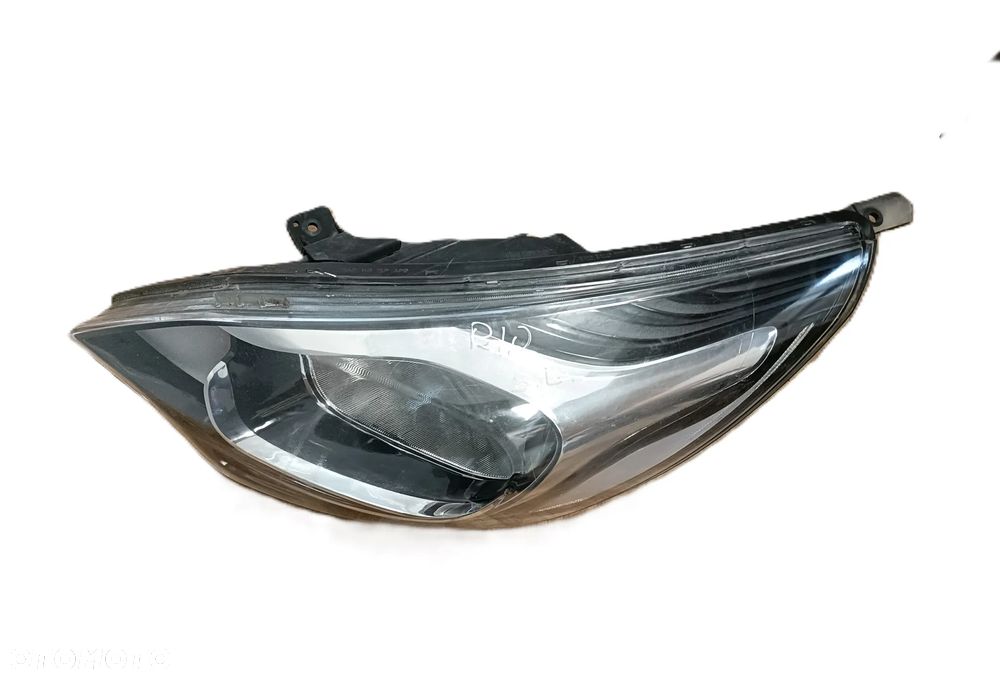 KIA RIO III LIFT 14-17 r. LAMPA LEWY PRZÓD LEWA PRZEDNIA LP EU 92101-1W + - 2