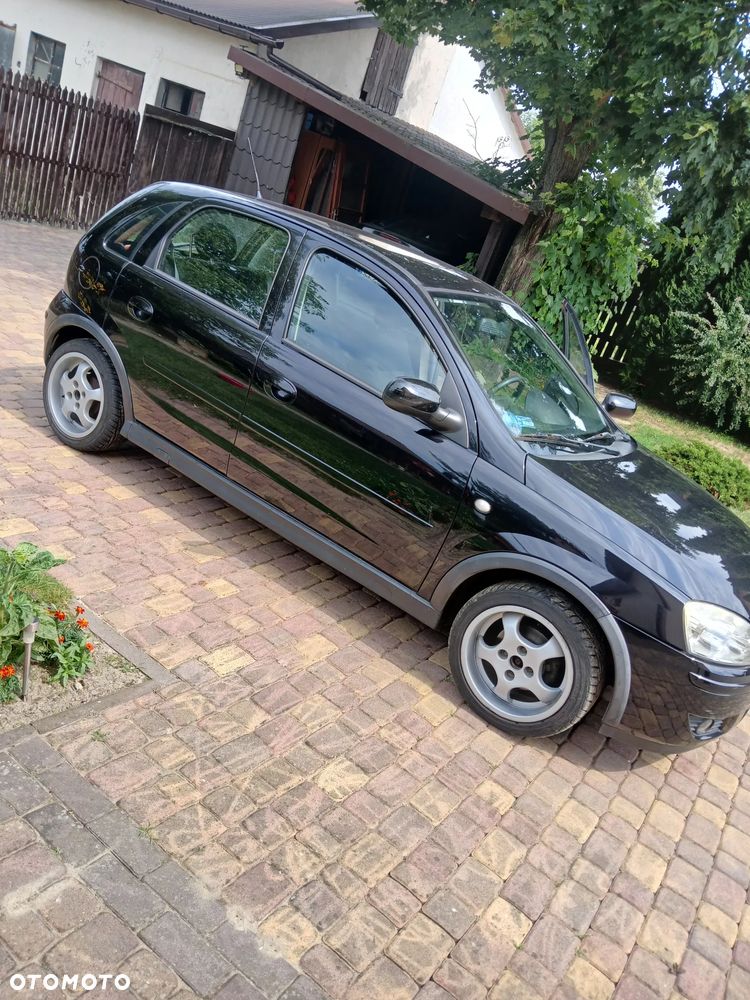 Opel Corsa 1.2 16V Cosmo - 3