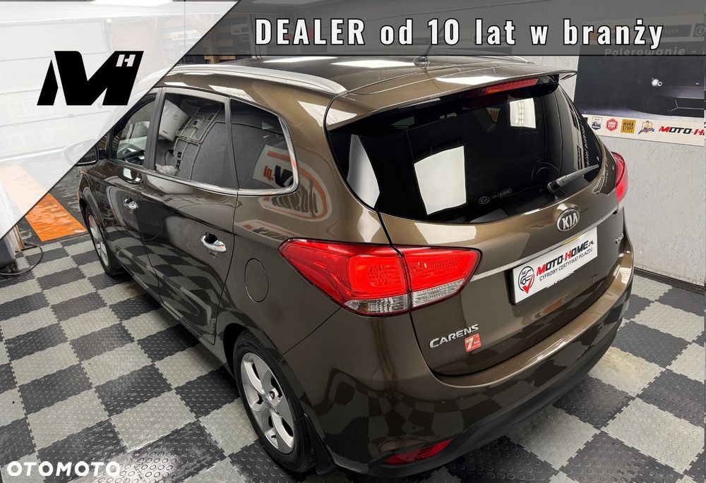 Kia Carens - 7