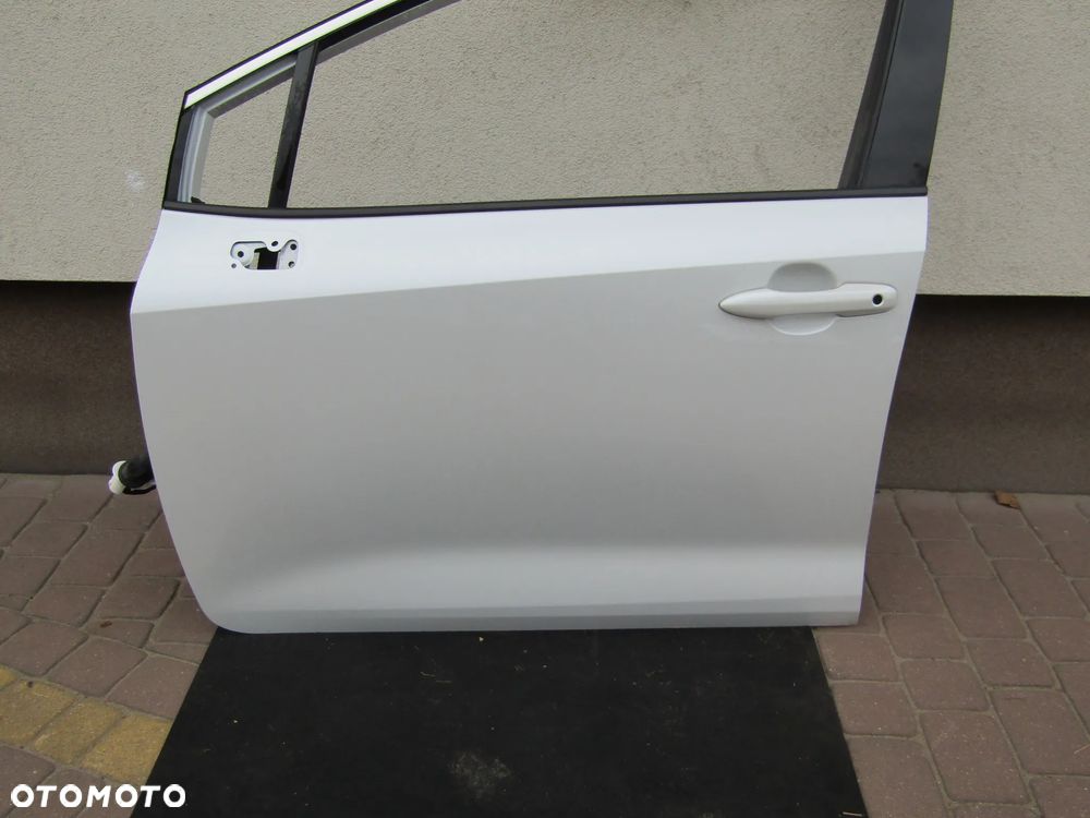 DRZWI LEWY PRZÓD TOYOTA COROLLA E21 20 25R 089 - 2