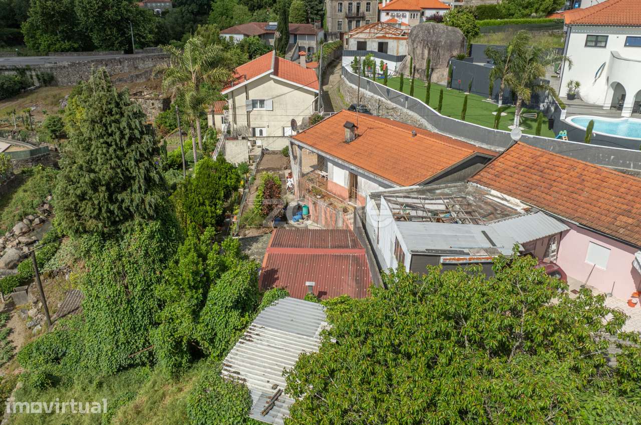 Moradia térrea com terreno em Landim - Grande imagem: 4/26