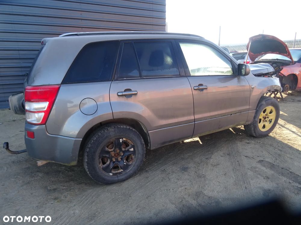 Suzuki Grand Vitara II (ZDL) drzwi zderzak klapa błotnik lampa części - 10