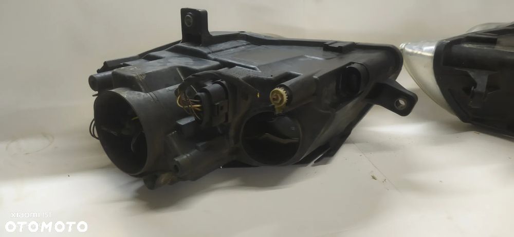 Lampy przednie VW Passat b6 lewa prawa komplet wszystkie części L041 - 10