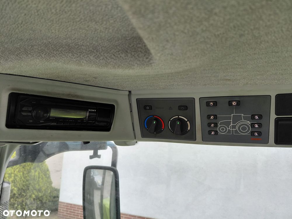 Claas Arion 620 CEBIS - 11