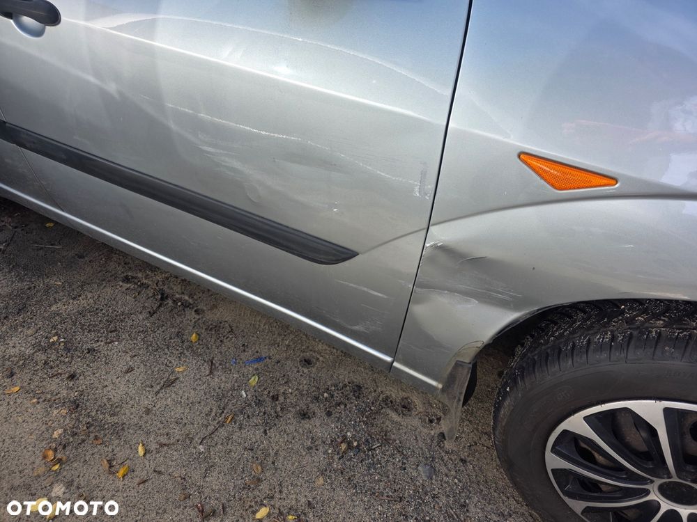Ford Focus 1.6 Comfort X / 100 - 7