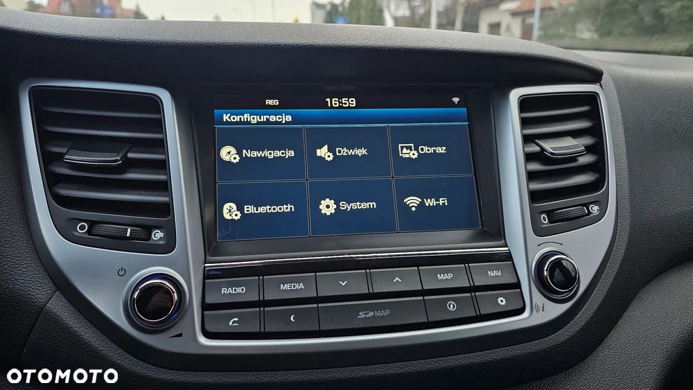 Hyundai Tucson blue 1.6 GDi 2WD Navi - 8