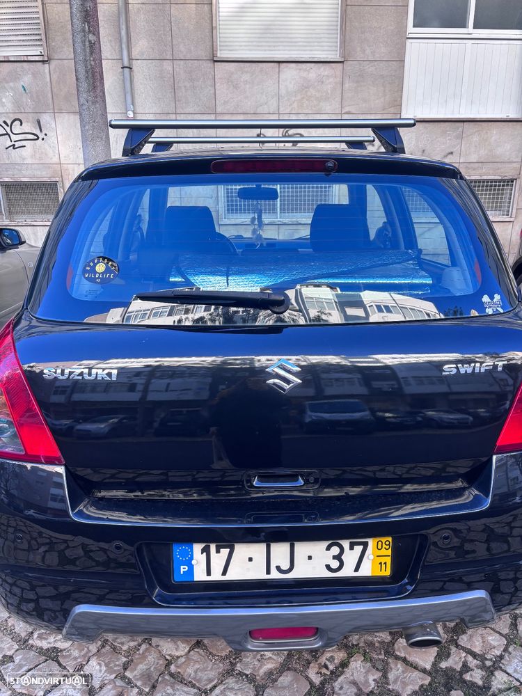 Suzuki Swift 1.3 DDiS Quiksilver - 5