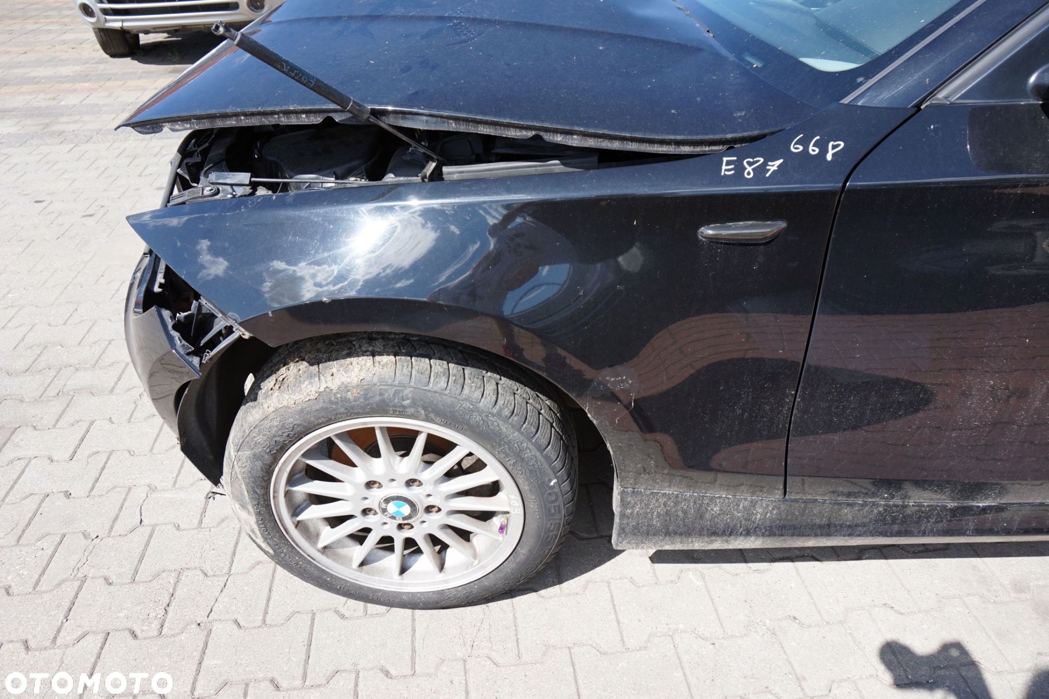 BŁOTNIK PRZEDNI LEWY 1 E87 LIFT 668 41357133227 CZARNY BMW 2007-2011 - 1
