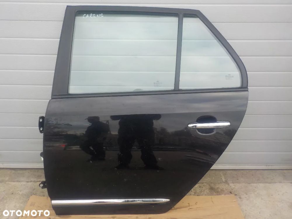 KIA CARENS DRZWI LEWY TYŁ 1U