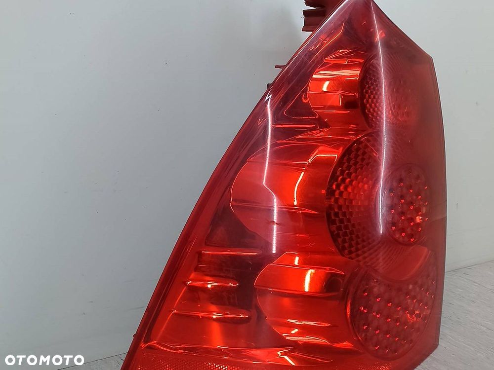 LAMPA TYLNA LEWA PEUGEOT 307 SW 557686A KOMBI - 12