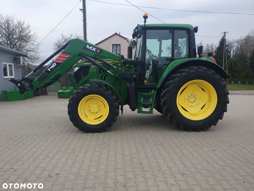John Deere 6115 M - 6