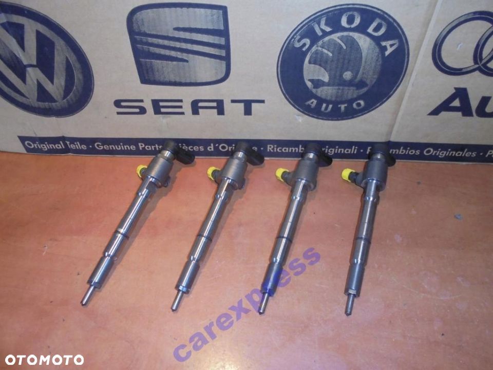 WTRYSKIWACZ E VW GOLF V VI JETTA III IV 1.6TDI - 1