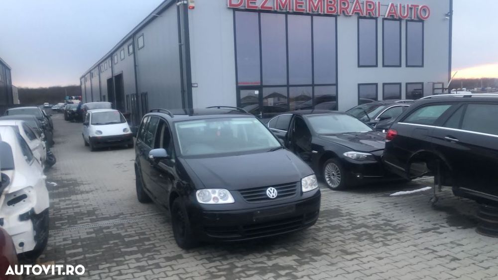 Dezmembram Volkswagen Touran 1.6 benzina an fabr 2006 - 2