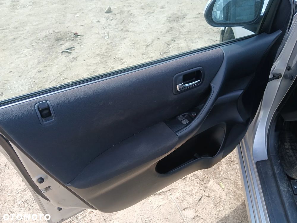 honda civic VII lift 5D fotel fotele kanapa deska kokpit podsufitka boczek boczki klamka podłokietnik - 2