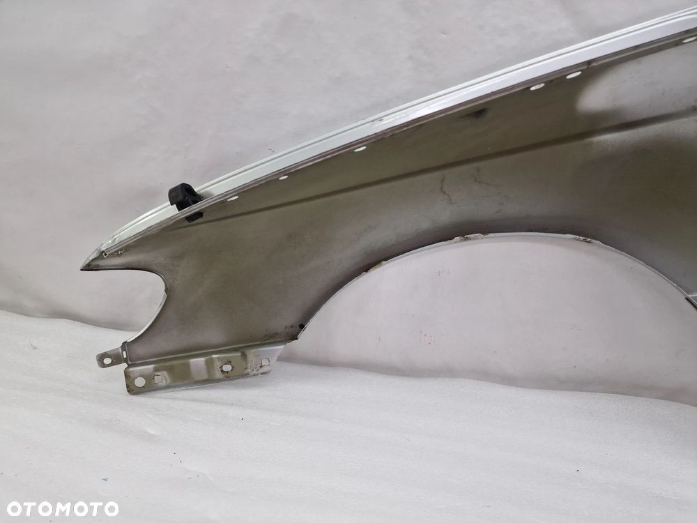 OPEL OMEGA C 99-02 SREBRNY PRAWY BŁOTNIK PRZEDNI PRZÓD , NR AUKCJI BŁ179 - 14