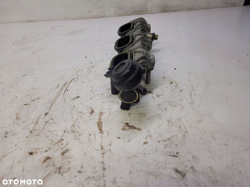 KOLEKTOR SSĄCY AUDI S4 S5 A6 3.0 TFSI 06E133110AB - 3
