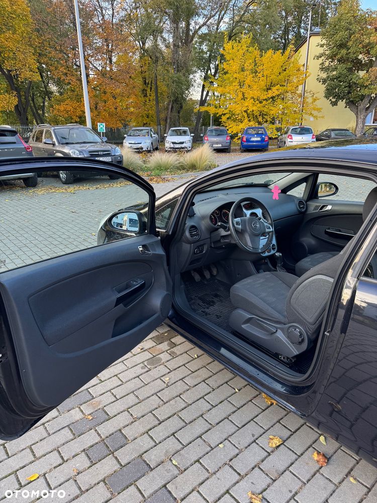 Opel Corsa 1.4 16V Satellite - 11