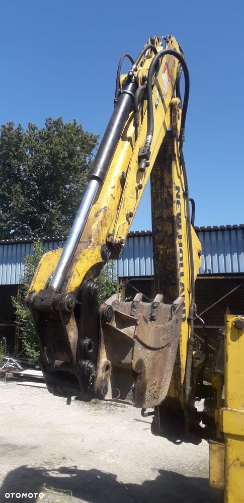 New Holland 110B - 7