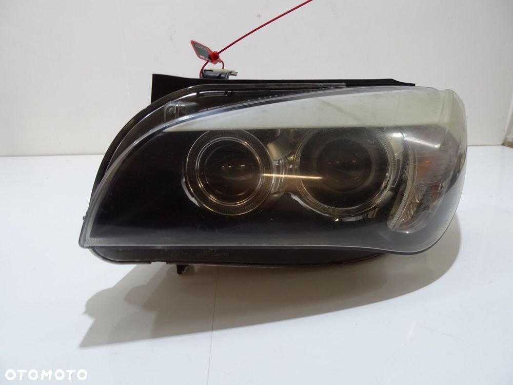 LAMPA LEWA PRZEDNIA XENON BMW X1 E84 OE 2990009