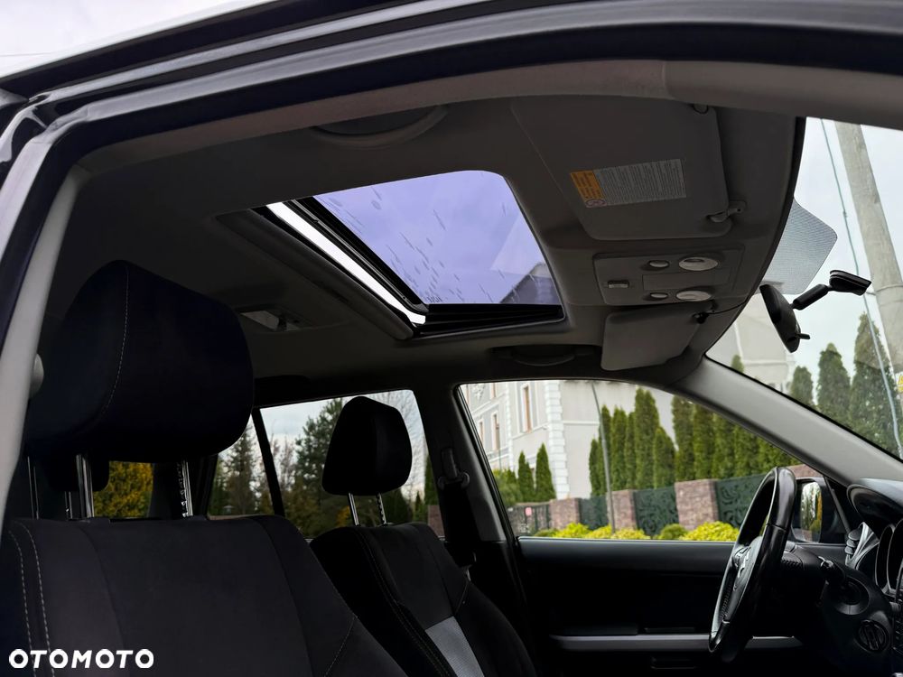 Suzuki Grand Vitara 2.0 Comfort + - 13