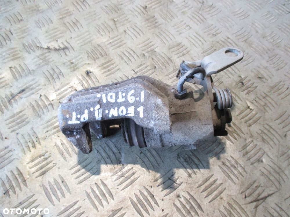 SEAT LEON II ZACISK HAMULCOWY TYŁ PRAWY TYLNY 1.9TDI - 4